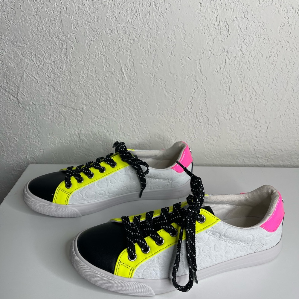 Vibrant Black and Yellow Sneakers with Neon Laces